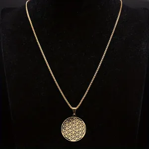 Golden stainless steel Flower of Life geometric pendant necklace on black velvet display