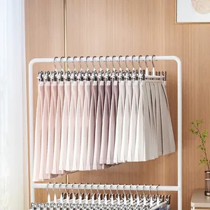 White stainless steel pant hangers with anti-slip clips for skirt and trouser storage