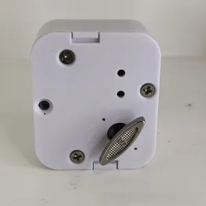 Mecanismo de caja de música de plástico blanco con llave de cuerda de metal plateado