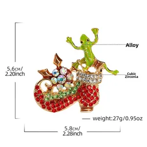 Detail view of crystal frog prince brooch with measurements 5.8x5.6cm and weight 27g