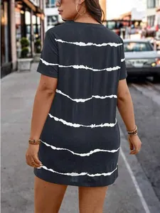 Detailed back view of a chic charcoal short-sleeved dress featuring white irregular stripes
