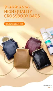 Detail view of four vintage oil wax leather kiss-lock crossbody bags with gold chains