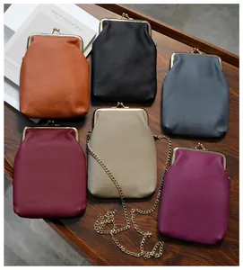 Detailed view of genuine leather crossbody phone bags in a variety of vibrant colors