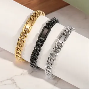 Close-up showing the jewelry clasps of three titanium steel Cuban chain bracelets.