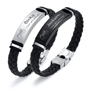 Set of custom engraved braided leather bracelets featuring stainless steel personalized plates