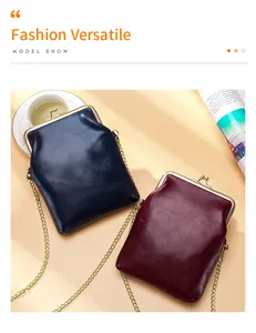 Detail of vintage leather phone bags with gold-tone kiss-lock and chain straps