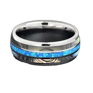 Elegant stainless steel ring with abalone shell and vibrant blue opal stone inlay.