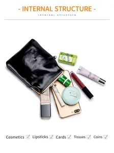Internal structure of black vintage leather clasp bag showing capacity for cosmetics and phone