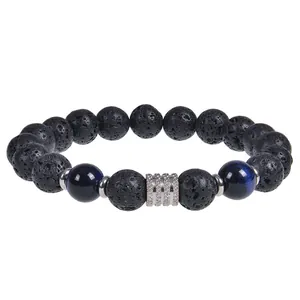 Detailed view of 10mm black lava stone and blue tiger eye beaded stretch bracelet for men