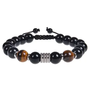 Close-up of 10mm obsidian and tiger eye beads on adjustable braided men's bracelet