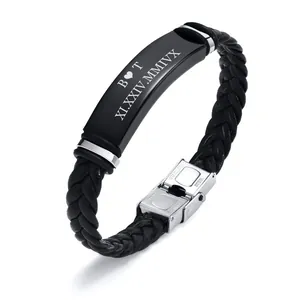 Personalized black braided leather bracelet featuring custom engraved steel plate