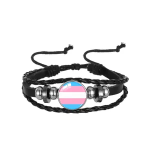 Detailed view of a multi-layer woven leather bracelet with transgender flag glass dome.