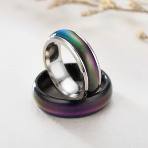 Close-up of 6mm stainless steel mood rings showing iridescent color change detail
