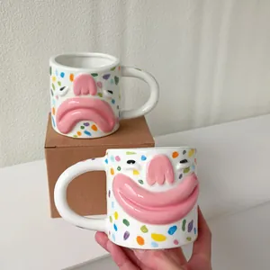 Unique and creative ceramic mug featuring a 3D big mouth face and vibrant colorful dots pattern