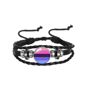 Close-up of layered woven leather bracelet with colorful striped glass center