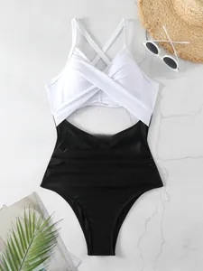 Maillot de bain une pièce élégant noir et blanc avec haut croisé et dos nu chic