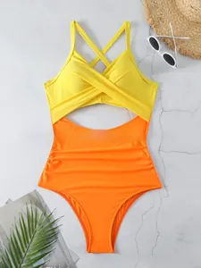 Maillot de bain une pièce sexy avec découpe croisée en jaune et orange éclatant