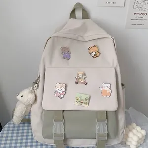Minimalist Korean style girls backpack with cute patches and plush keychain