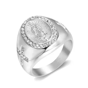 Detailed view of silver stainless steel ring featuring Virgin Mary and cross motifs