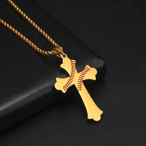 Macro view of gold-plated stainless steel cross necklace with red baseball stitching detail