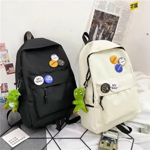 Sacs à dos d'étudiant minimalistes noir et beige avec porte-clés dinosaures mignons