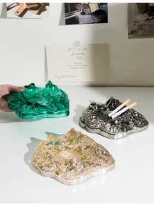 Artistic mountain-shaped glass ashtray set in green smoke and amber for luxury home decor