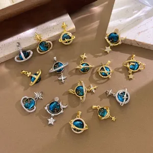 Macro detailed view of dreamy planet series jewelry pendants with star and moon charms