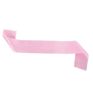 Detailed view of smooth light pink blank satin sash for DIY custom party events