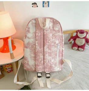 Detailed rear view of a pink tie-dye print backpack with adjustable shoulder straps