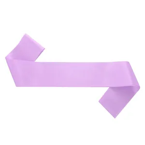 Macro detail of a blank lavender purple satin ceremonial sash showing smooth fabric texture