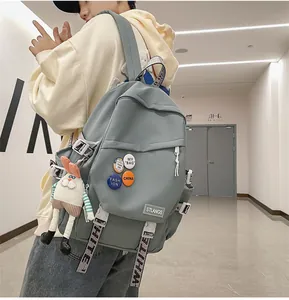 Large capacity grey-blue student backpack with trendy patches and cute rabbit charm