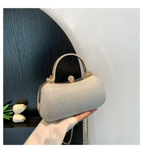 French style silver glitter evening clutch bag with gold handle and rhinestone clasp