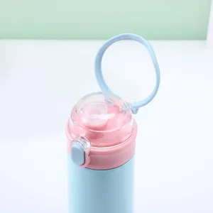 Stylish Ins-style cute portable straw water bottle with blue ring handle and pink lid design