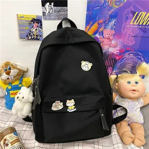 Zainetto nero stile Harajuku con spille carine e portachiavi a forma di orsetto bianco