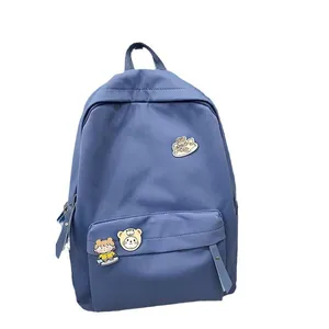 Zaino scolastico blu scuro minimalista per ragazze con graziose spille a cartone animato