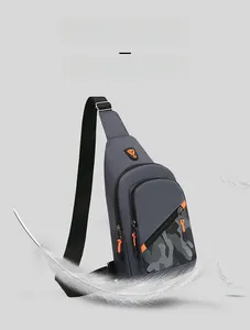 Men's stylish grey chest bag with camouflage detail and orange zipper pulls