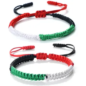 Handmade woven bracelet in national flag colors with adjustable drawstring closure