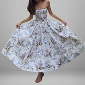 Detail view of a long floral print A-line dress with purple flowers and blue ribbons