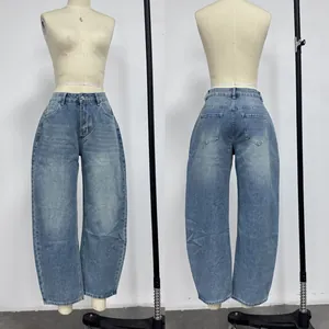 Front and back view of women's retro washed blue curved-leg high-waisted denim jeans