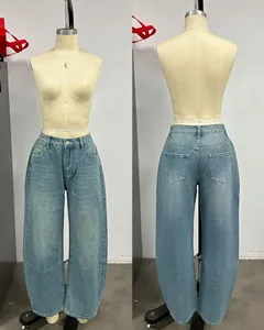 Detailed front and back views of light wash high-waisted wide-leg curved denim pants