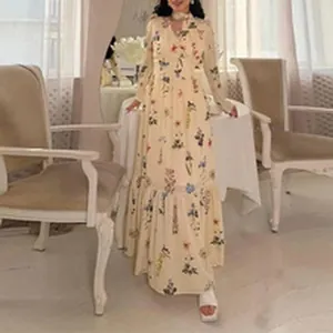 Full body view of an elegant cream V-neck floral maxi dress featuring bubble sleeves