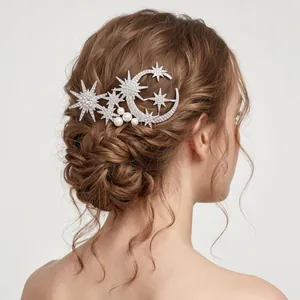Exquisite detailed view of rhinestone star and moon hair comb in braided bridal updo style