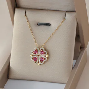 Elegante, zweifach faltbare Herz-Kleeblatt-Halskette in Gold mit roten Steinen und Kristallen