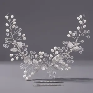 Elegant silver bridal hair vine with faux pearls and crystals for wedding hairstyles.