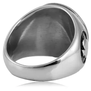 Close-up detail view of a polished stainless steel ring with a black spade emblem side