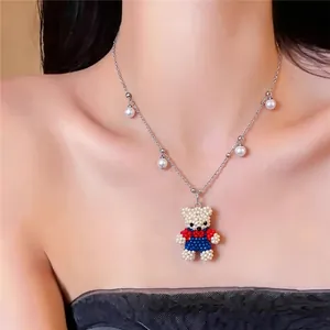 Handcrafted pearl bead bear pendant necklace with silver chain for women