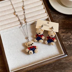 Handmade beaded bear jewelry set including necklace and earrings in a gift box