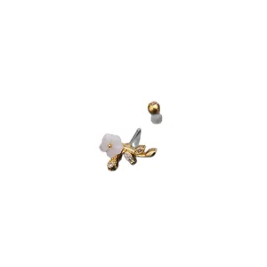 Elegant stainless steel screw back ear bone stud with a delicate floral and leaf design
