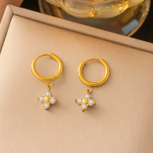 Dainty four-leaf flower zircon hoop earrings with 18k gold plating for a luxury look