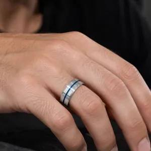 Men's stainless steel ring with brushed silver finish and blue center groove design